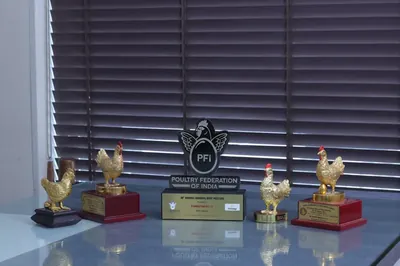 Poultry Federation of India, IPDL and Broiler Breeders Association North awards on the office shelf