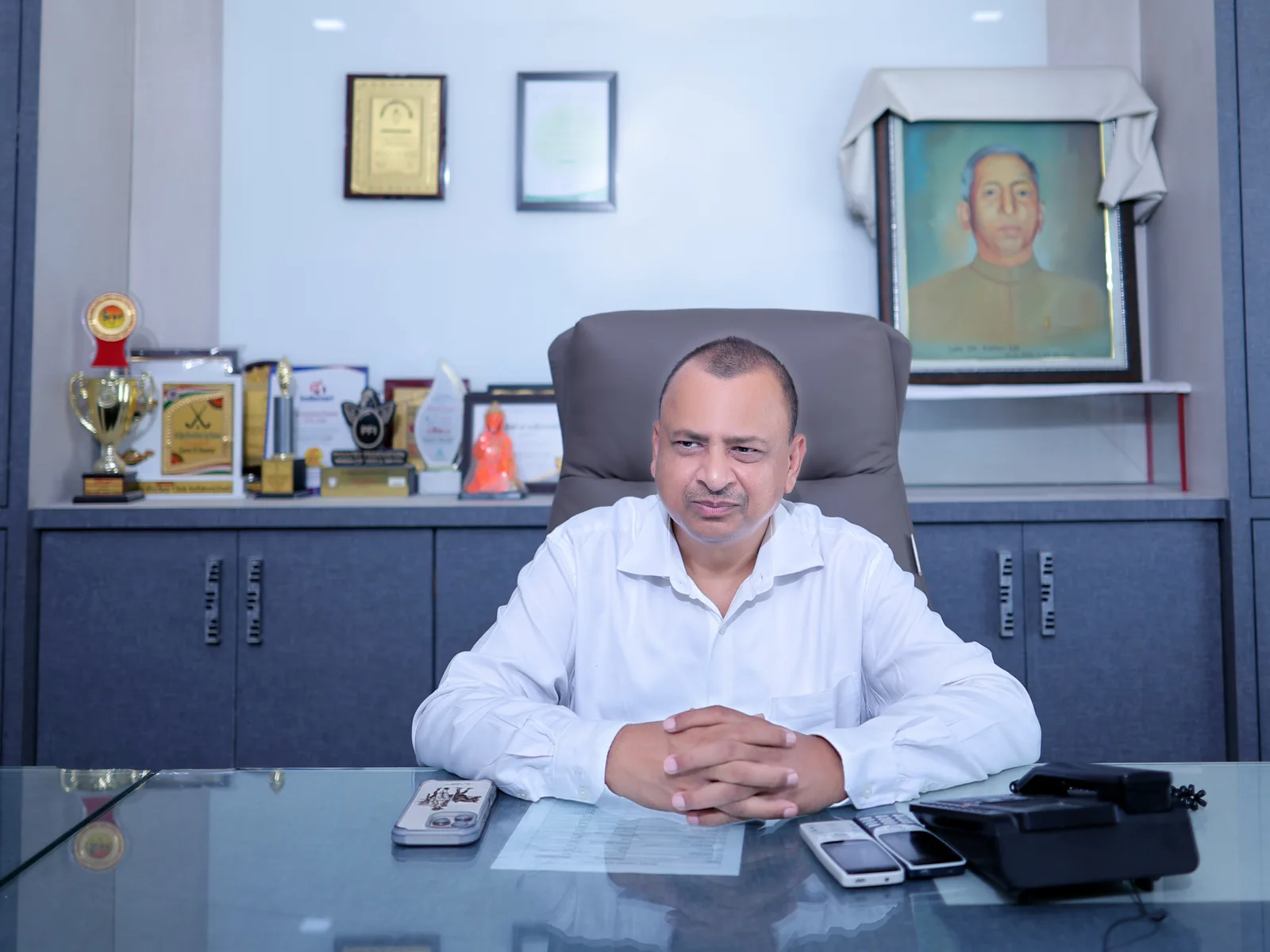 Mr. Shiv Charan Dass, Chairperson of Arunodya Feeds, at his desk at Safidon