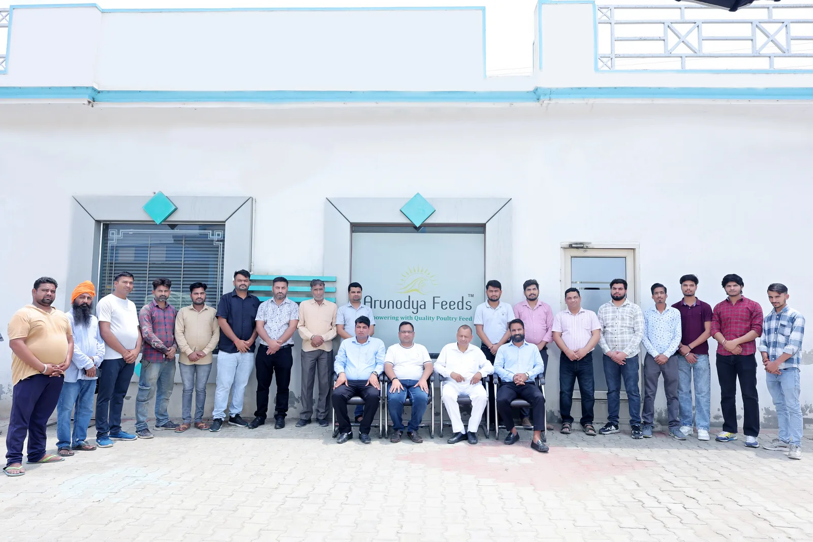 The Arunodya Feeds team outside the Safidon plant